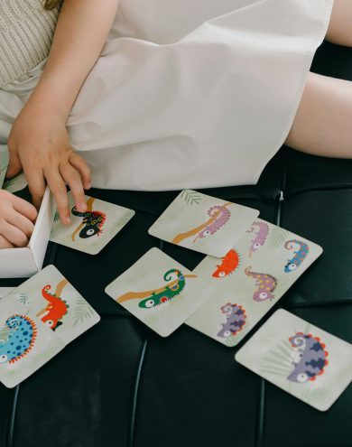 Child playing with learning cards