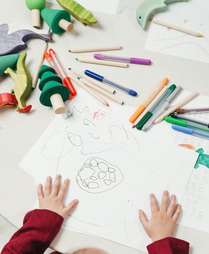Kid hands on a drawing