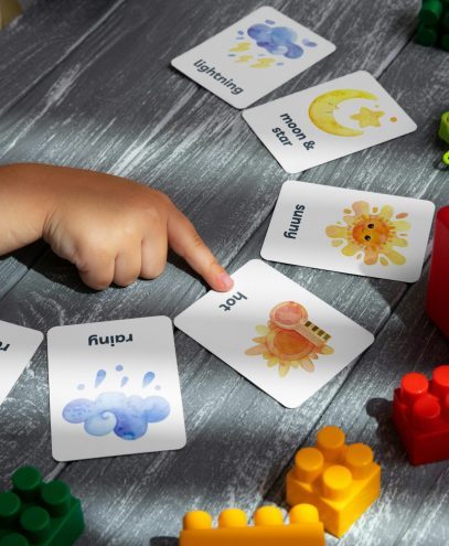 Kid pointing at a word card