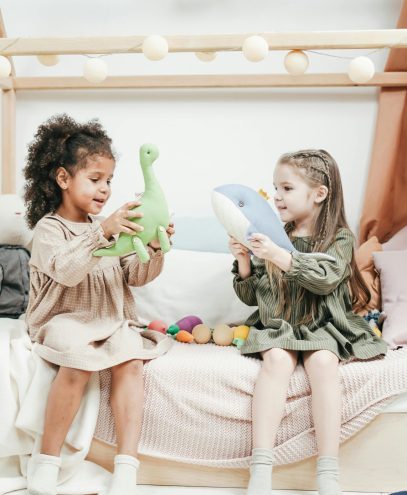 Two kids playing with toys